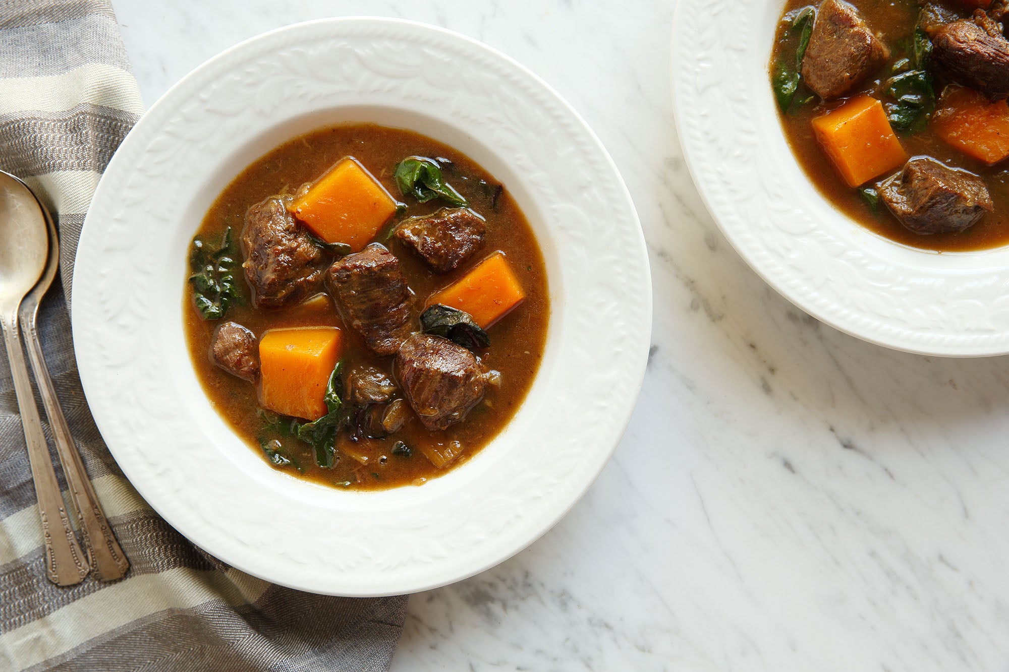 Cider-Braised Lamb Shoulder with Cardamom, Butternut Squash & Greens