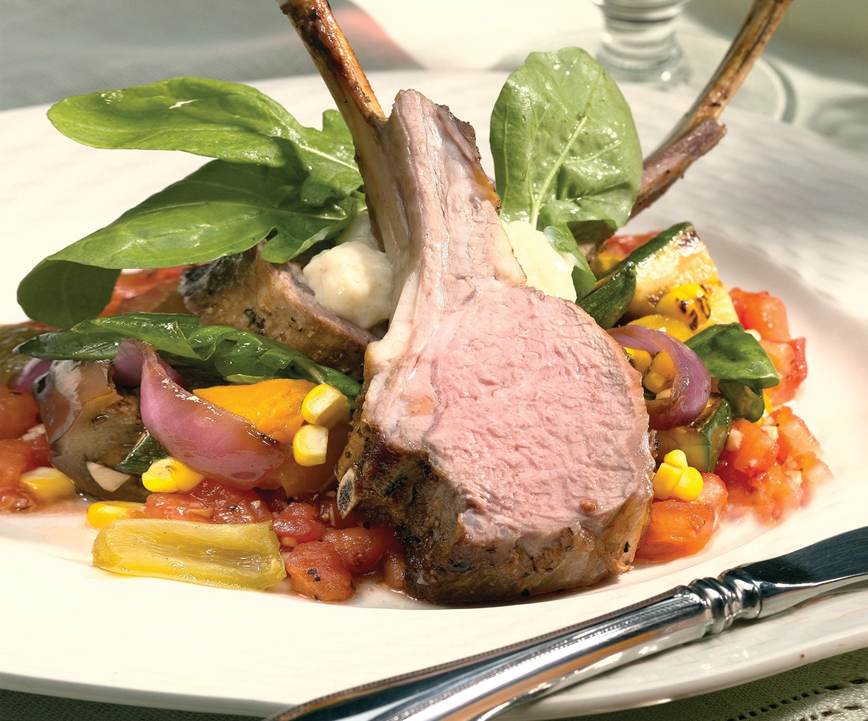 Grilled Rack of Lamb, Summer Vegetable Salad & Charred Tomato Vinaigrette